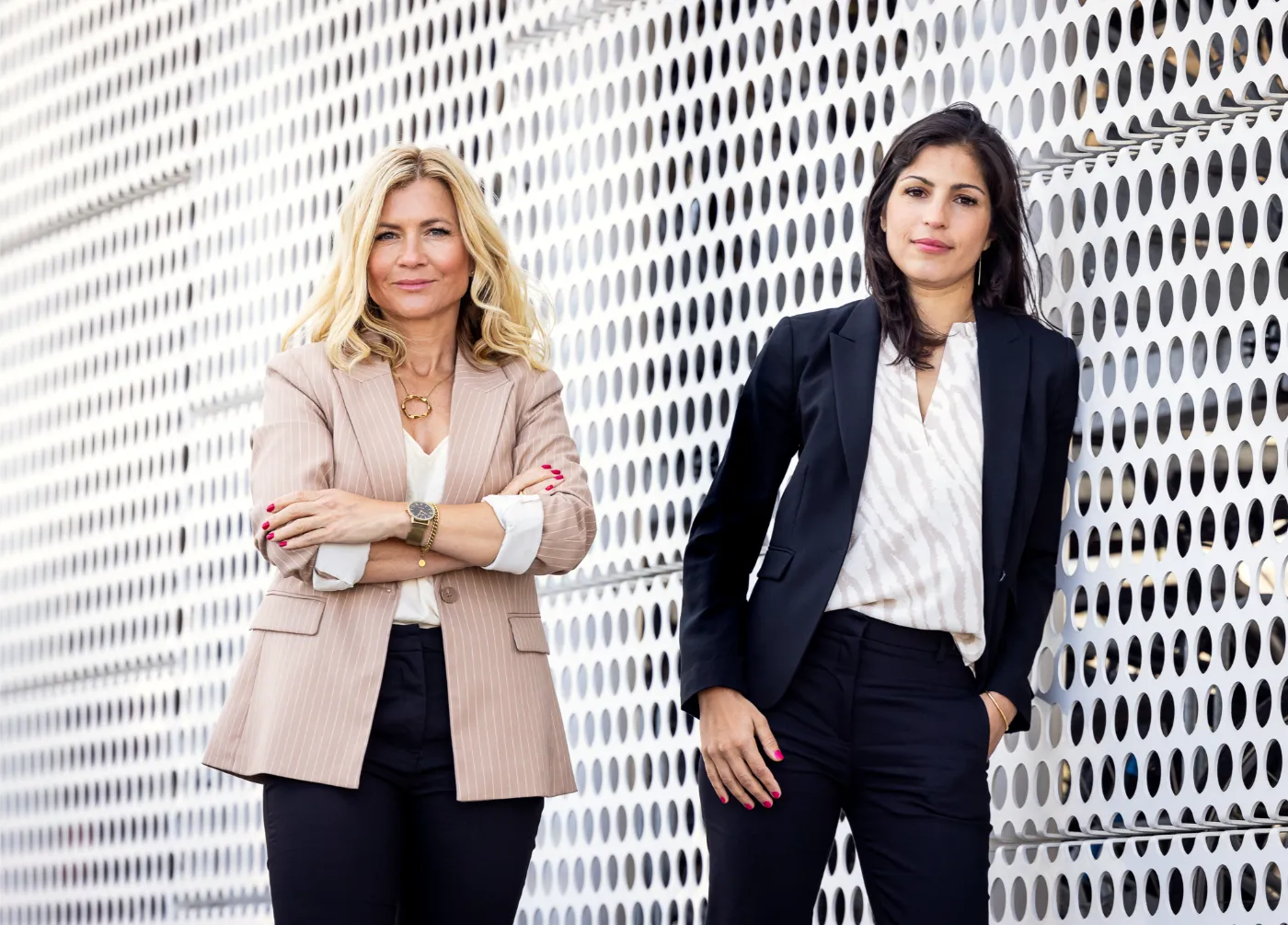 Two female entrepreneurs with a white background